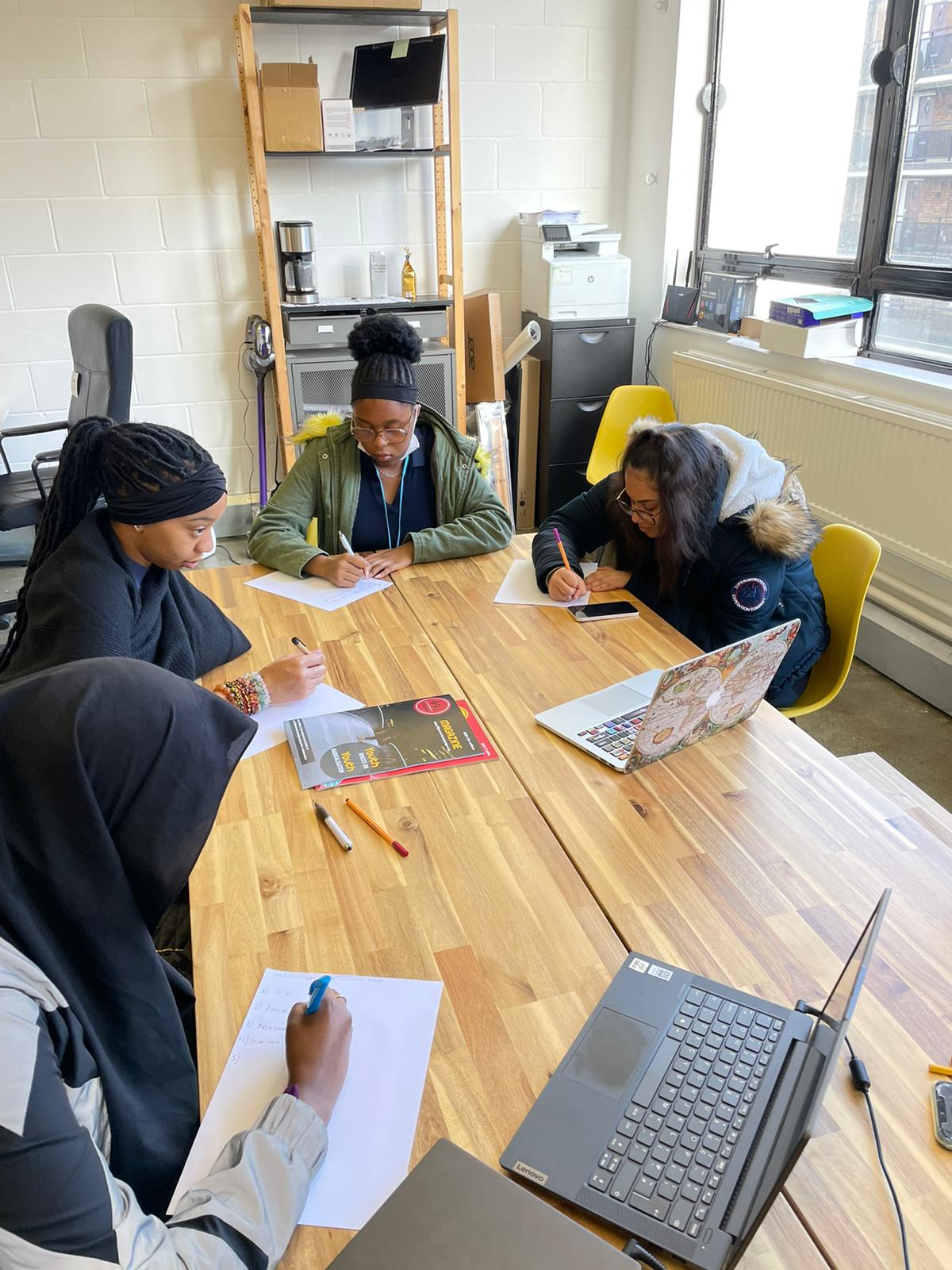 Work experience students in the office