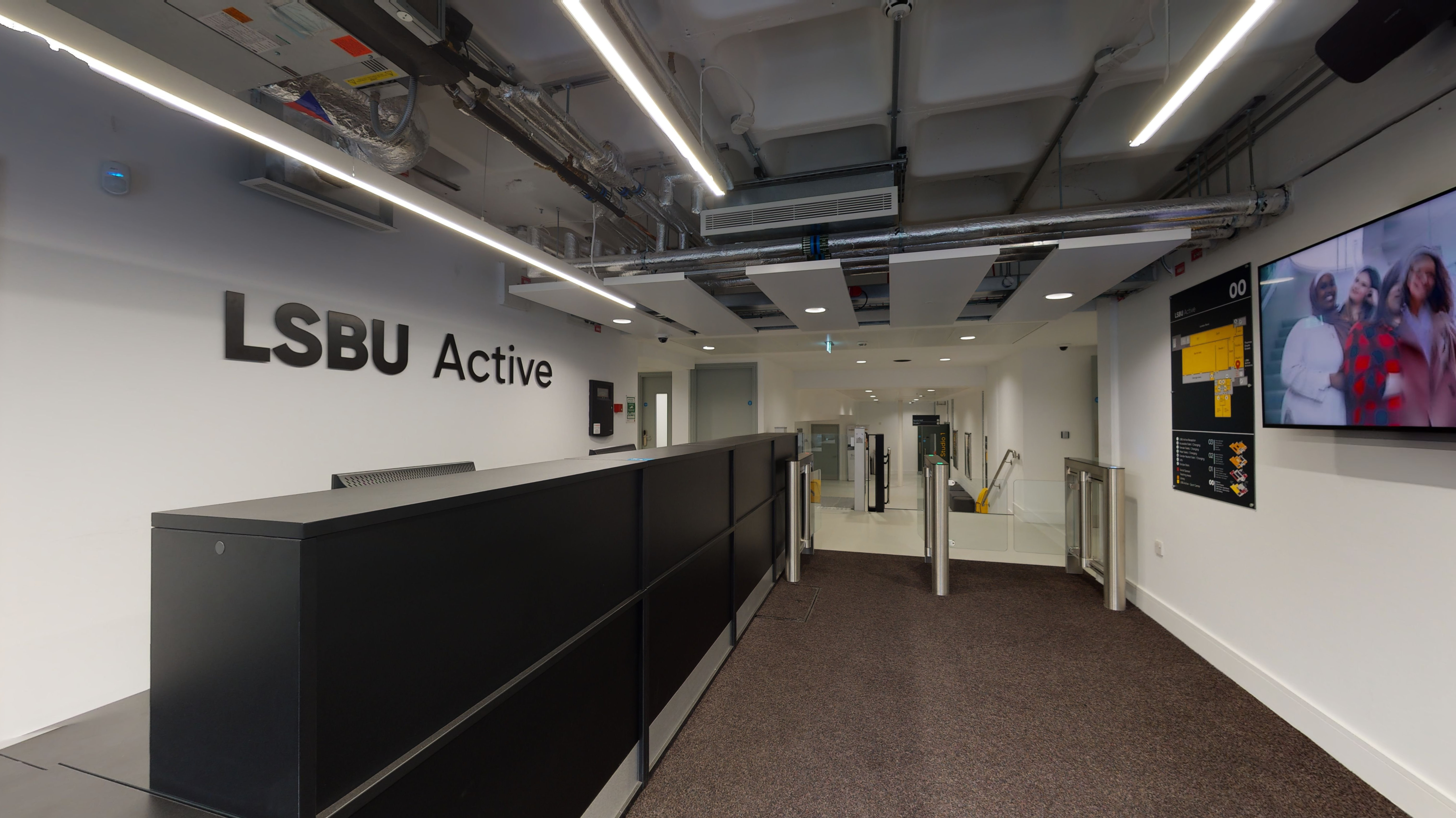 LSBU Active reception with desk on the left and entrance gates in front